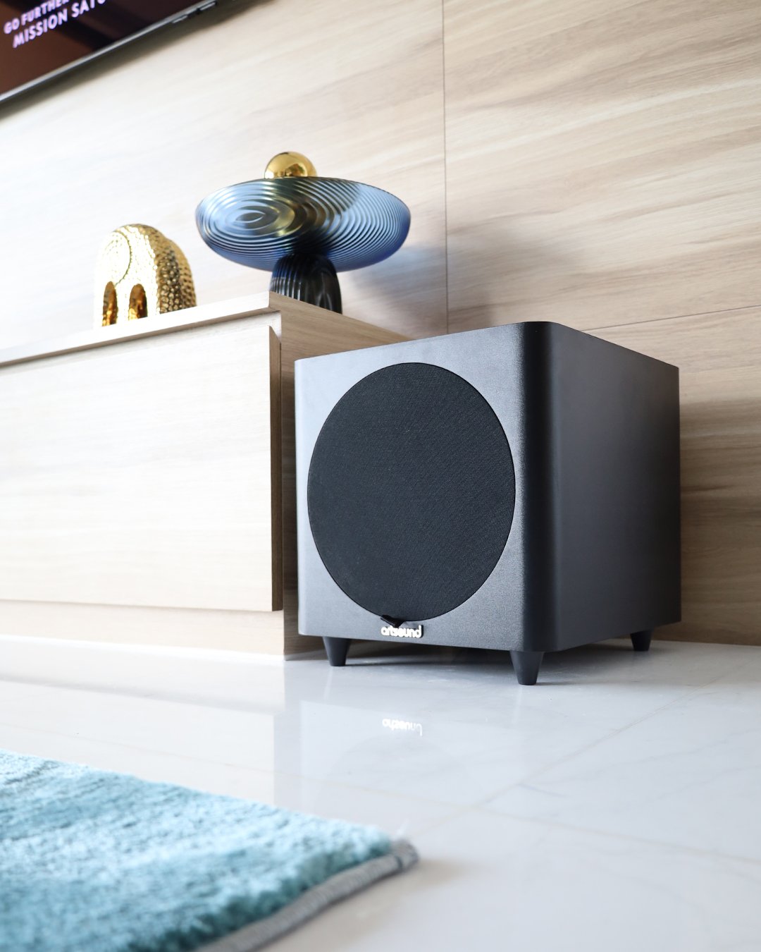 Artsound subwoofer used as the low-frequency channel in a home cinema and surround sound setup